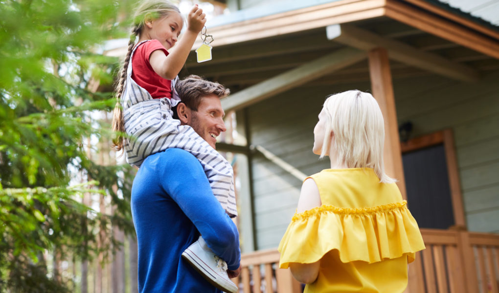 Happy Family With A new House