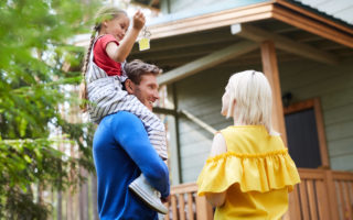 Happy Family With A new House