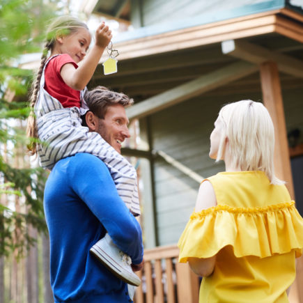 Happy Family With A new House