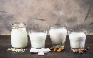 Vegan non dairy alternative milk. Coconut, almond, hazelnut, oat homemade milk.